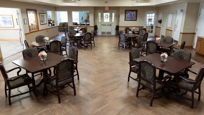Dining room with tables and chairs in a cozy setting