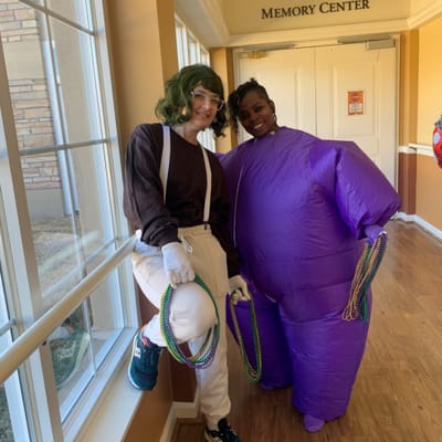Residents dressed in costumes during an activity in the Memory Center