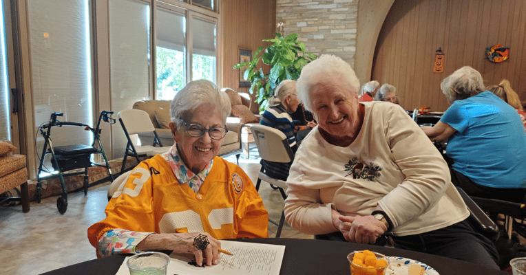 Residents smiling and enjoying each other's company
