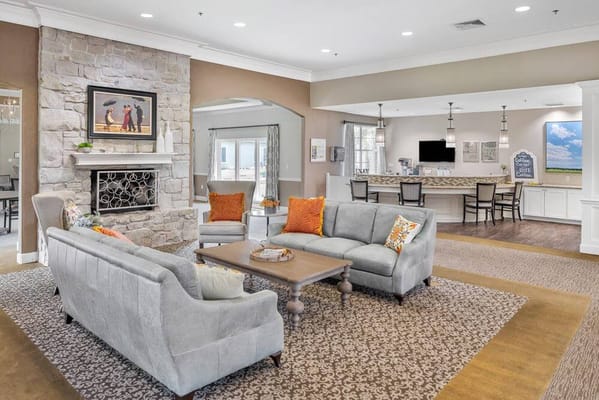 Cozy common area with seating and a fireplace