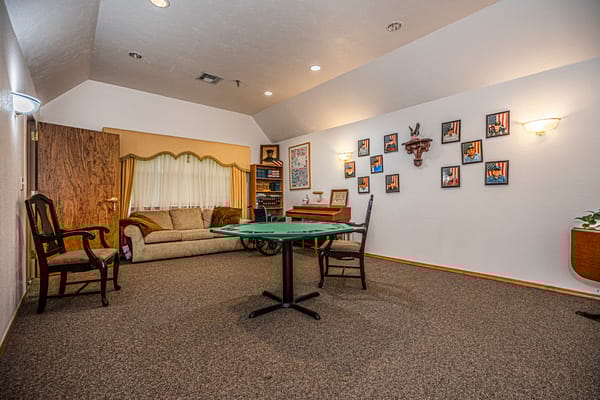 Cozy activity room with seating and decorations