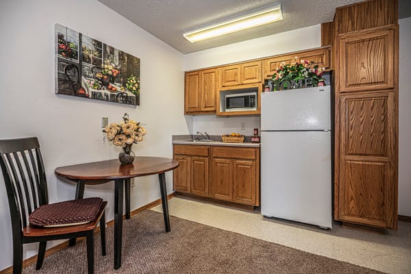 Cozy kitchen space with table and flowers