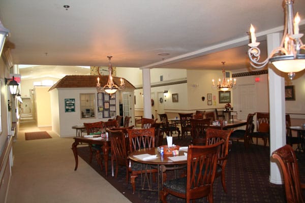 Dining room with tables and chairs in an interior space