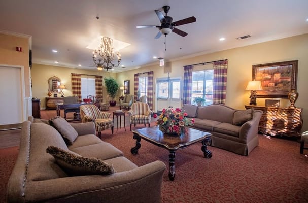 Common area with seating and decorative lighting