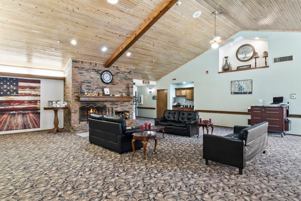Cozy common area with seating and fireplace