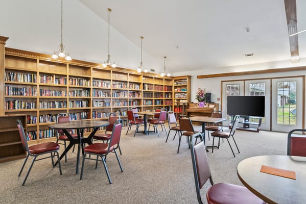 Interior view of a cozy library space for residents
