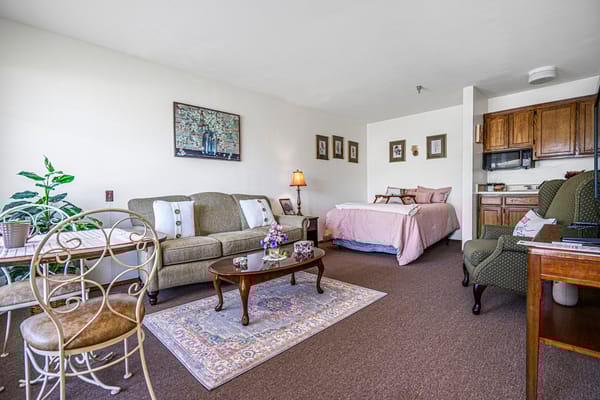 Cozy resident room with seating and kitchenette