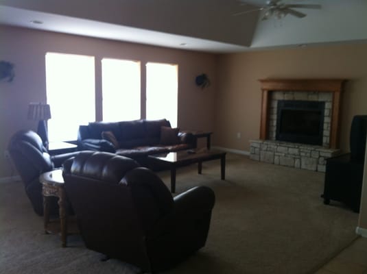 Cozy common area with seating and a fireplace