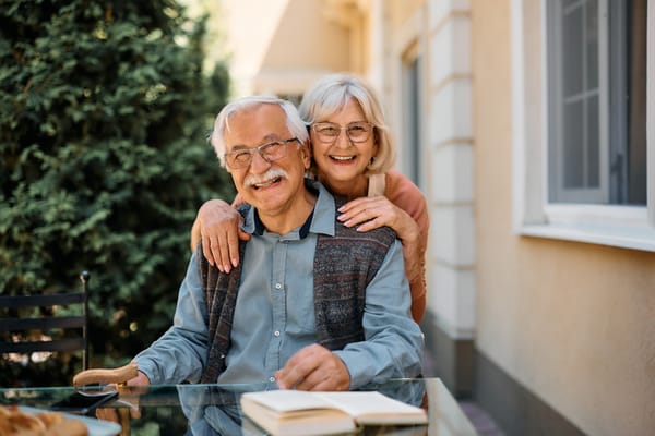 Happy elderly couple enjoying time outdoors