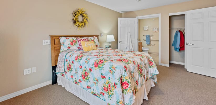 Comfortable private bedroom with floral bedding