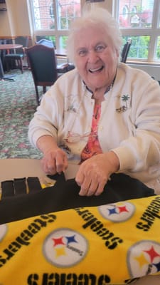 Resident engaging in an arts and crafts activity