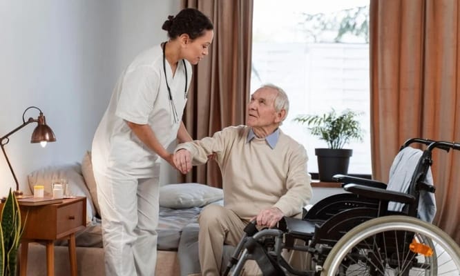 A caregiver assisting a resident in a cozy room