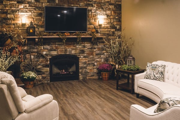 Cozy common area with a fireplace and seating