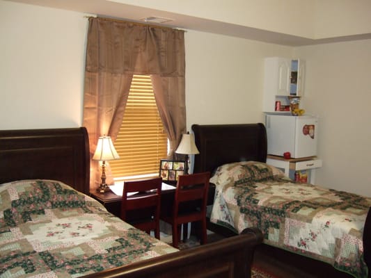 Cozy shared bedroom in the assisted living facility