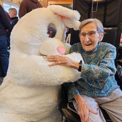Resident enjoying time with a costumed character