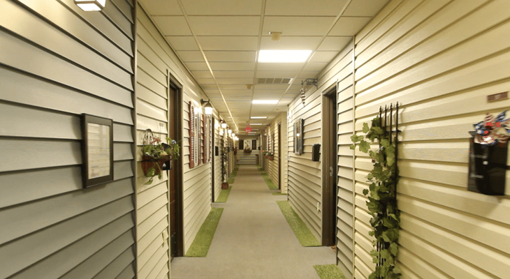 Interior hallway with resident rooms and decor
