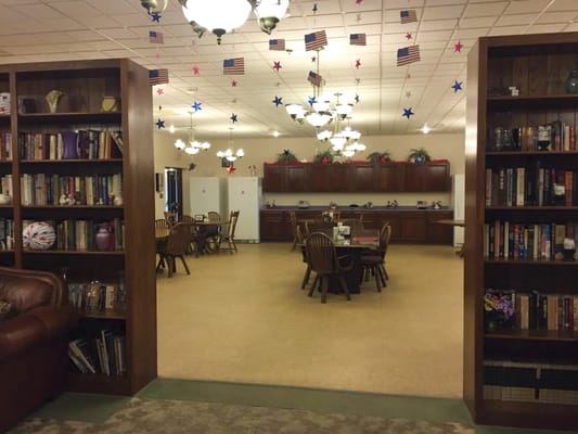 View of a common area with tables and chairs