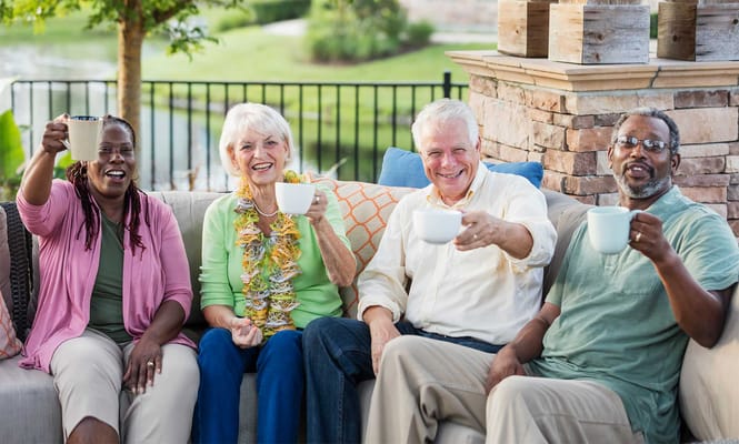 Residents enjoying drinks outdoors together