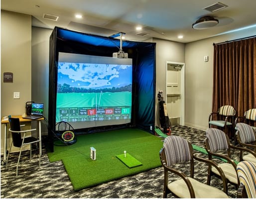 Indoor golf simulator set up for residents to enjoy