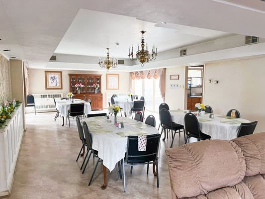 Dining room with tables set for a meal