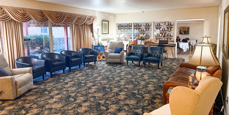 Bright common area with seating and decor