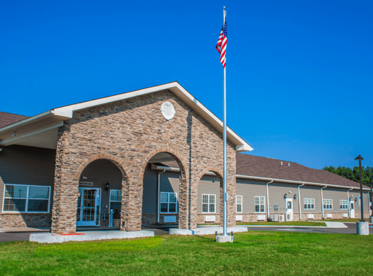 Exterior view of Sayre Memory Care Residence building