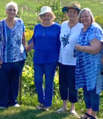 Residents enjoying time together in a garden