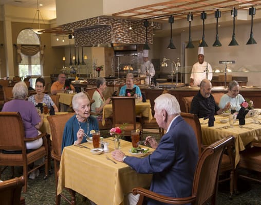 Residents enjoying a meal in the dining room