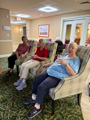 Residents enjoying conversation in a common area