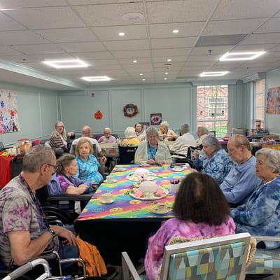 Residents enjoying a social activity in a common room