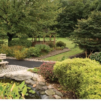 Garden area with gazebo and landscaped pathway