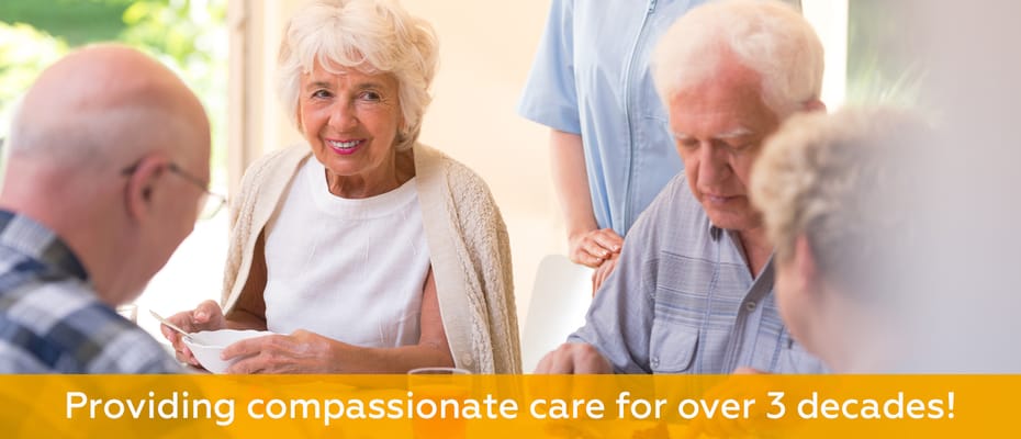 Residents enjoying a meal together in a dining area