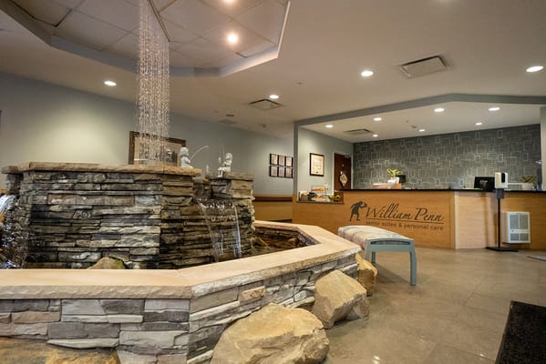 Interior view of the facility's lobby area with a water feature