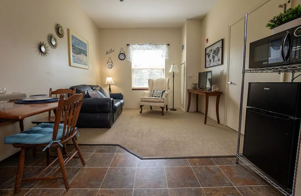 Cozy interior of a resident room with furniture