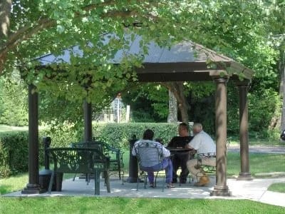 Residents enjoying a moment in a gazebo
