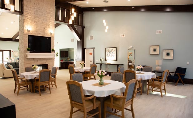 Bright and spacious dining area with tables and chairs