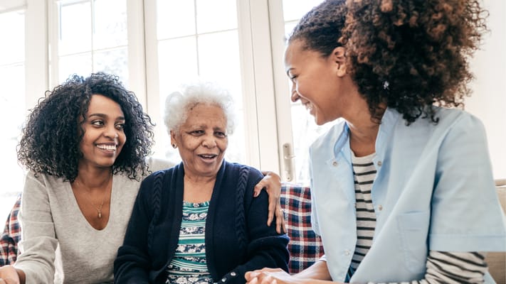 Residents enjoying a conversation in a common area