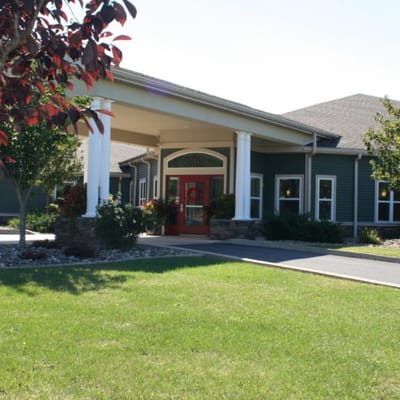 Exterior view of Wolf Run Village with landscaping