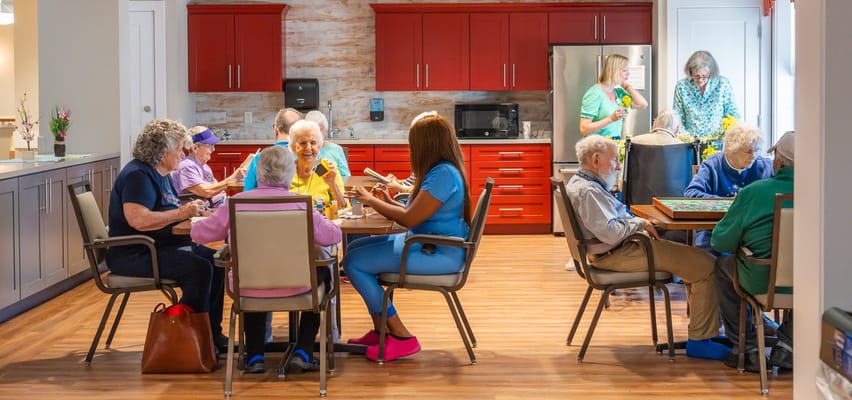 Residents enjoying a meal in a communal area