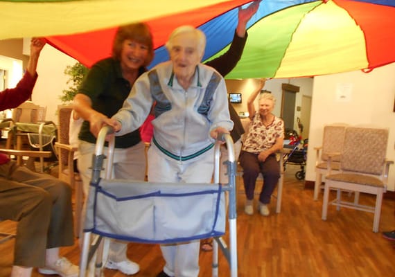 Residents enjoying a recreational activity indoors