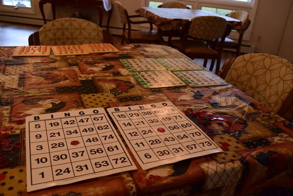 Bingo setup with cards and markers on a table