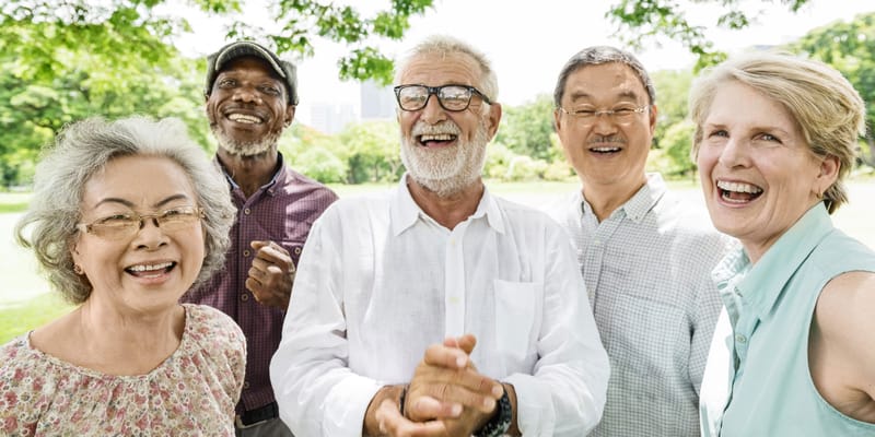 Group of seniors enjoying time together outdoors