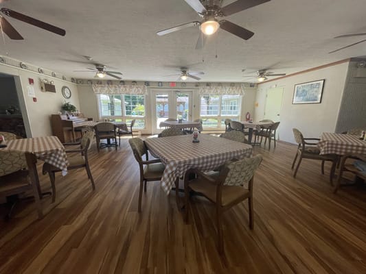 Dining area with tables for residents