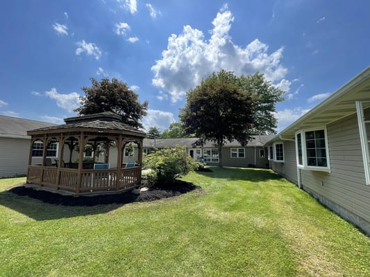 Well-maintained garden area with gazebo
