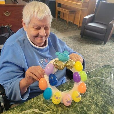 Resident participating in an Easter activity