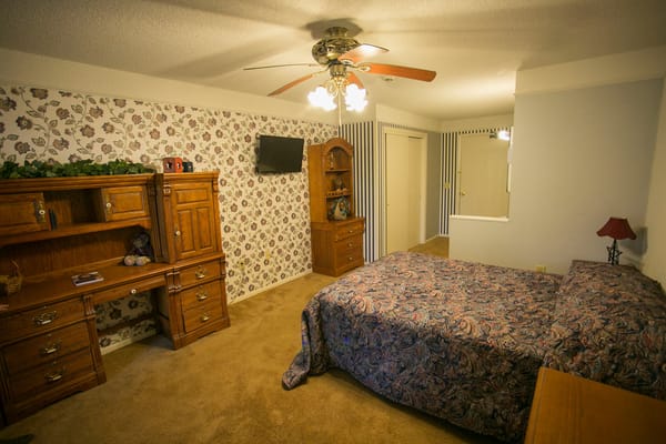 Cozy private bedroom with floral decor
