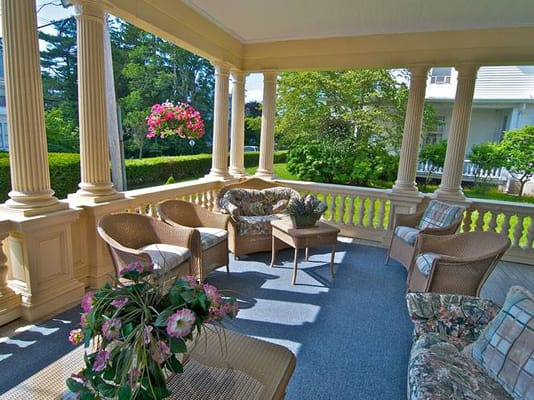 A cozy outdoor sitting area with wicker furniture