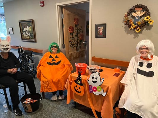 Residents celebrating Halloween with decorations and costumes