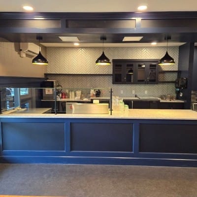 Modern dining area with counter and seating