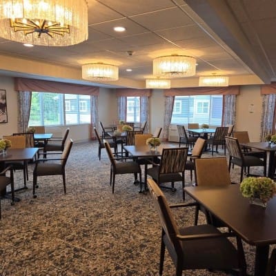 Bright and welcoming dining room with tables and chairs